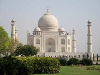 White building dome towers green 2 - a green lawn in front free wallpaper