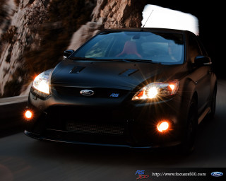 Black car driving rock wall - f 8 aperture free wallpaper