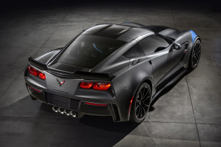 Black sports car above dark - a black floor free wallpaper