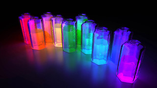 Bottles colorful light black background - fluorescent free wallpaper