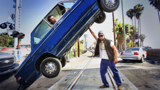 Man holding car upside down - david lachapelle free wallpaper