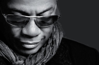 Man glasses scarf cellphone looking - derold page free wallpaper