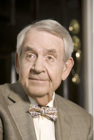 Man suit bowtie smiling camera - a smile free wallpaper