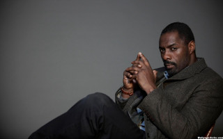 Man sitting hands clasped face - pre free wallpaper