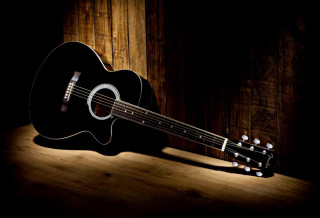 Guitar wooden table dark spotlight - a spotlight free wallpaper