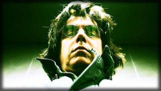 Man sunglasses jacket staring distance - eric taylor free wallpaper
