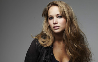 Woman long hair gray background - a picture free wallpaper