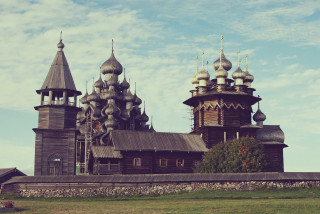Wooden church clocktower spires grassy - roof free wallpaper