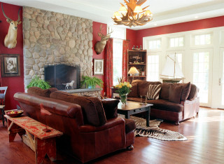 Living room fireplace deerhead couch - a living room free wallpaper for desktop