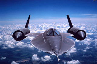 Jet flying above clouds sky - ray free wallpaper