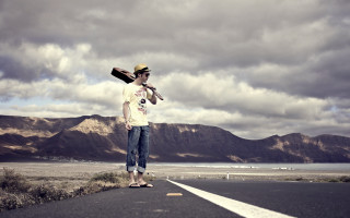 Man bats mountains lake sky - cinematic photography free wallpaper
