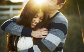 Man woman hugging field grass 2 - free love wallpaper