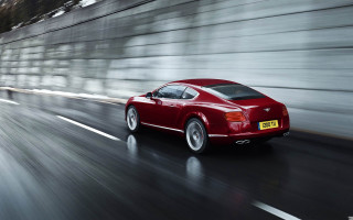 Red car driving road concrete - andrew bell free wallpaper