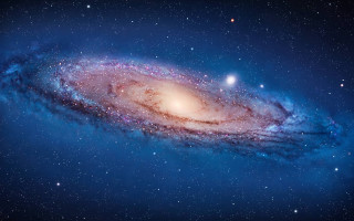 Large colorful spiral galaxy bright - blue center free wallpaper
