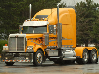 Yellow semi truck parking lot 2 - a parking lot next free wallpaper