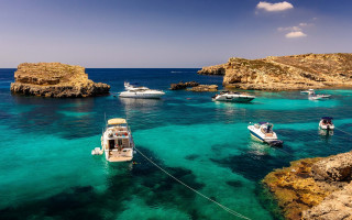 Boats rocky shore ocean blue - the ocean next free wallpaper