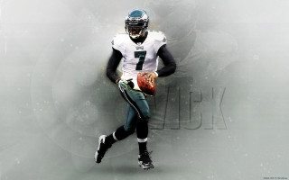 Football player holding ball running - the ball free wallpaper