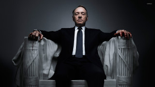 Man suit tie chair crossed - free portrait wallpaper