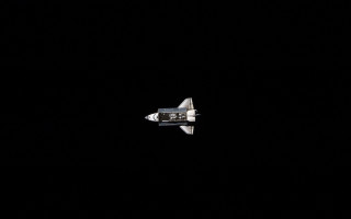 Space shuttle flying dark sky - the light free wallpaper