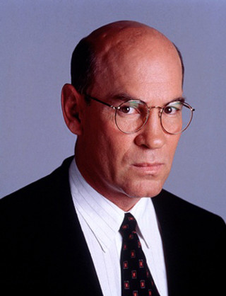 Man suit tie serious pose - his face and shoulders free wallpaper