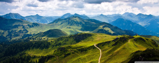 Winding road green mountains cloudy - lush free wallpaper