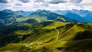 Winding road lush mountain range - road free wallpaper