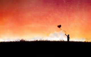 Heart shaped balloon red sky - a person holding free wallpaper