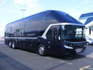 Large black bus parking lot - dave kendall free wallpaper