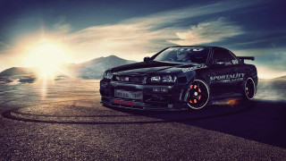 Black car orange wheels mountains - fine art free wallpaper