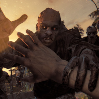 Zombie hand person knife outstretched - a sunset in the background free wallpaper