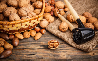 Basket of nuts wooden spoon - a wooden table free wallpaper