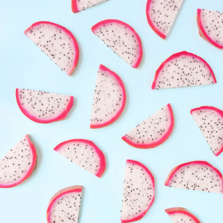 Sliced fruit blue surface pink - professional free wallpaper