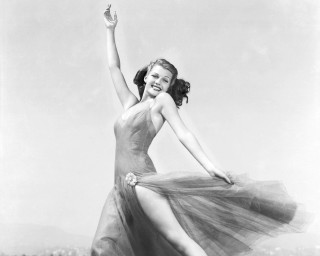 Woman dress posing arms up - a woman in a dress free wallpaper