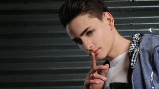 Young man finger sign jacket - a young man free wallpaper