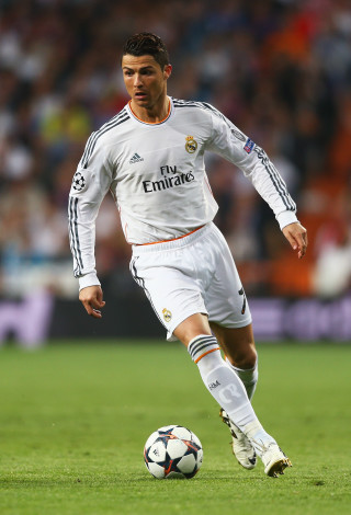 Man white uniform playing soccer - a marble sculpture free wallpaper