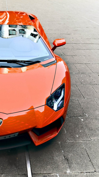 Orange sports car parking lot 5 - nice free wallpaper
