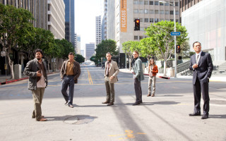 Men standing city street buildings - tall building free wallpaper