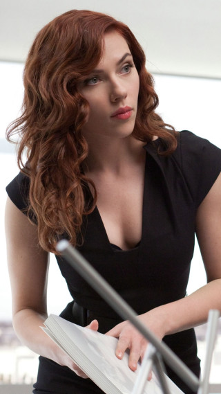 Woman black dress holding folder - red hair free wallpaper
