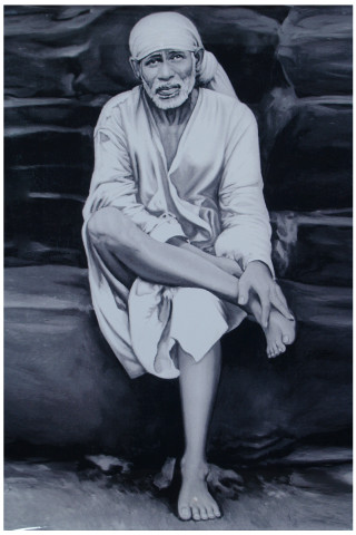 Man sitting rock legs crossed - a rock free wallpaper