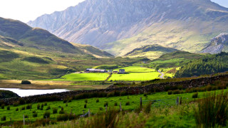 Green valley lake mountains clouds - a green valley free wallpaper