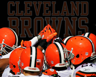 Football players orange helmets cleveland - gritty free wallpaper