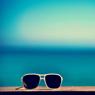 Sunglasses ocean ledged blue sky - near free wallpaper