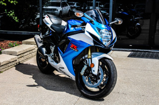 Blue white motorcycle sidewalk building - product photo free wallpaper
