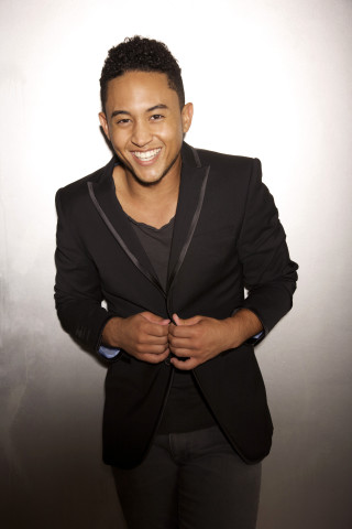 Man suit smiling camera hands - everett warner free wallpaper