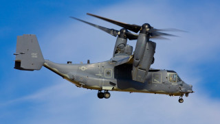 Military helicopter flying blue sky - the front of the helicopter free wallpaper
