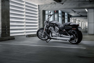 Motorcycle parking garage building windows - a parking garage next free wallpaper