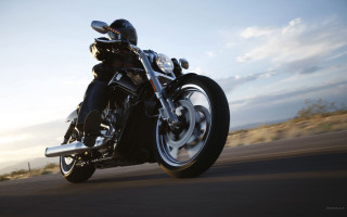 Motorcycle driving road sunlight scenery - motion blur free wallpaper for desktop