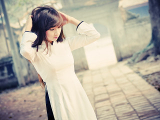 Woman white shirt holding hair - a white shirt free wallpaper