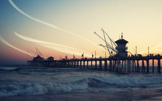 Pier clocktower sunset water contrails - carl hoppe free wallpaper