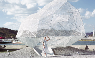 Woman sculpture large white object - geometric shape free wallpaper